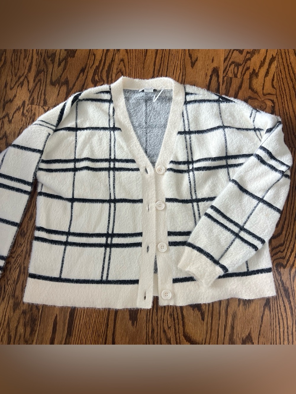 Rachel Zoe Ivory Cardigan with Black Windowpane Plaid.